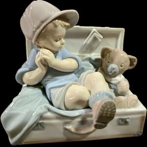 Porcelain Boy and Teddy Bear Figurine